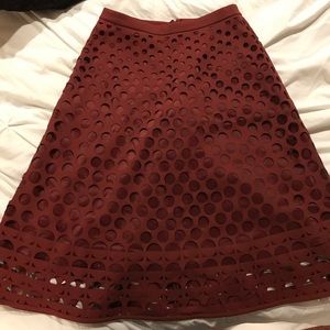 Laser cut circle midi skirt
